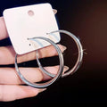 Oversized Metal Hoop Earrings – Exaggerated Statement Style 2025 – Hidden Picks Online